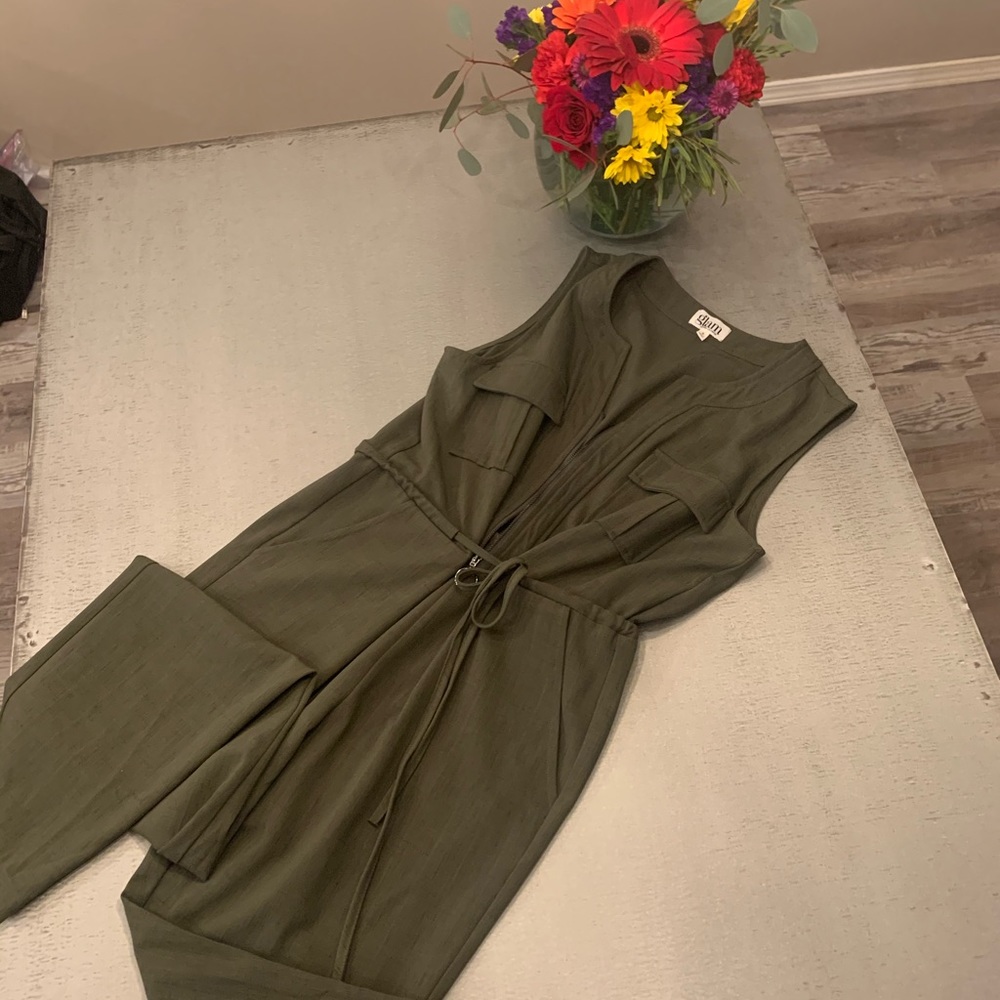 Pre owned, but never worn olive color jumpsuit
